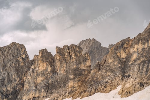 Preview: Beautiful nature with white snow on rocky mountain