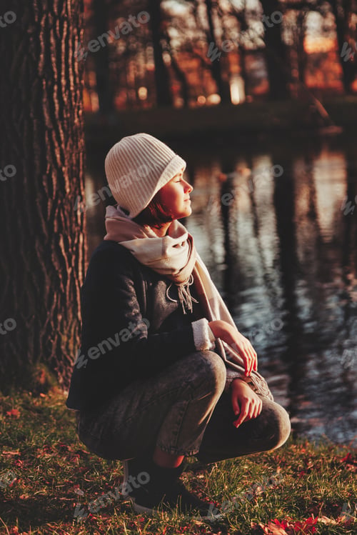 Preview: Cute girl teenager walking in the autumn park
