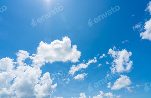 Preview: Blue sky and white clouds with sunlight on sunny day. World ozone day concept. Blue sky background