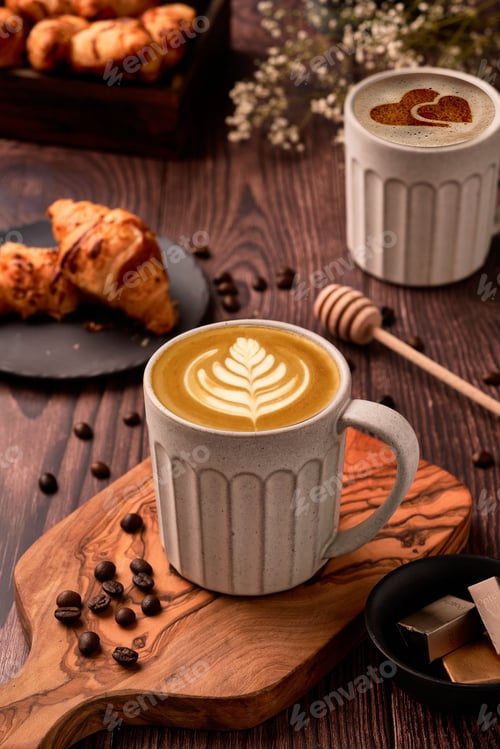 Preview: Morning breakfast with croissants and cups of coffee