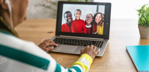 Preview: Happy Afro family having video call with laptop cam during corona virus outbreak