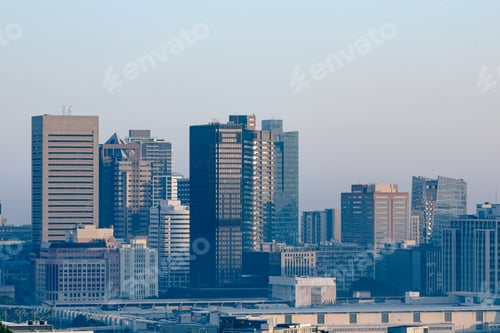 Preview: General view of cityscape with multiple modern buildings and skyscrapers in the morning
