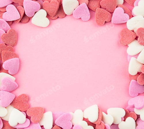 Preview: Frame of hearts on a pink background. Copy space. Flat composition. Valentine's Day concept.