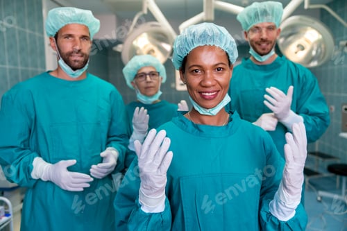 Preview: Medical Team in Teal Scrubs Standing Together