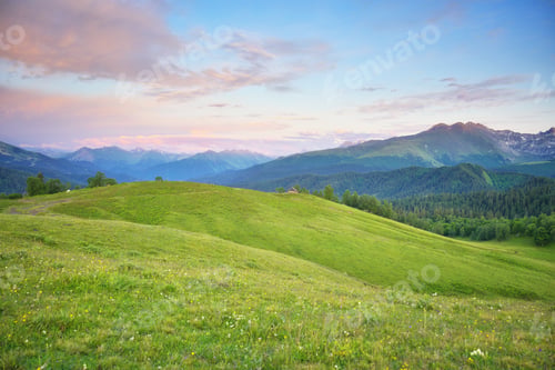 Preview: Mountain green valley during the sunset.