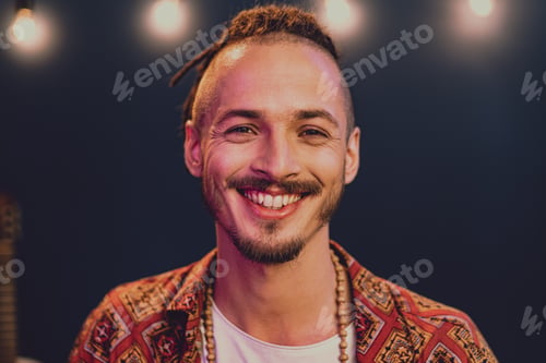 Preview: Close-up portrait of a young stylish man with dreadlocks