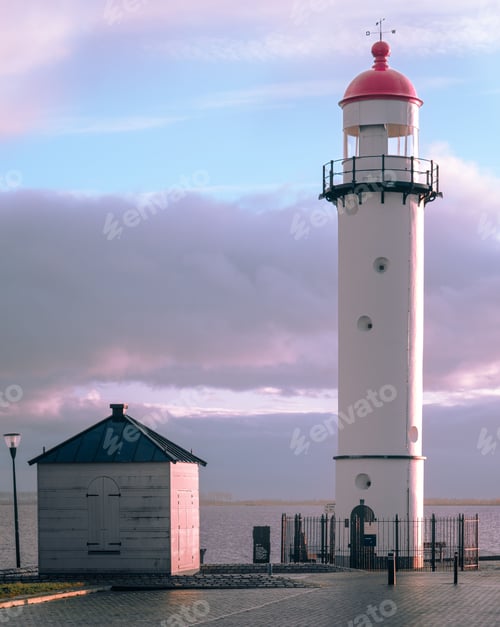 Preview: Lighthouse situated at the end of a pier surrounded by its iconic red roof