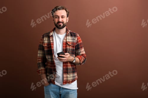 Preview: handsome man on brown background