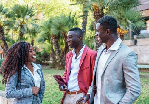 Preview: Group of diverse multiracial Business people talking outdoors in a park