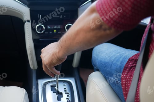 Preview: Male hand changing gear in the car,