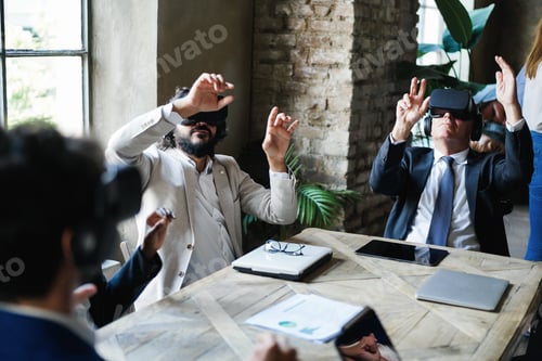 Preview: Multiethnic business people wearing vr goggles inside office - Focus on senior man hands