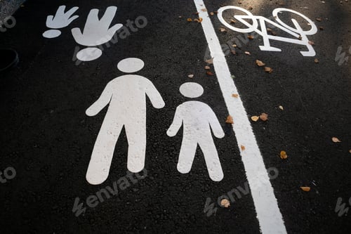 Preview: white pedestrian pathway marking on tarmac