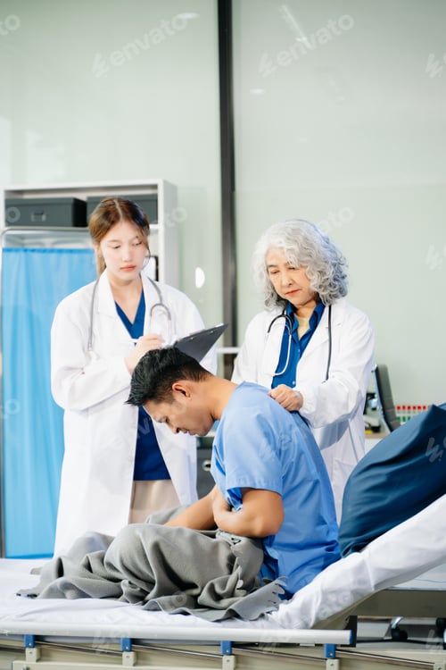 Preview: Hospital Ward Male and Male Professional Asian Doctors Talk with a Patient, Give Health Care Advice