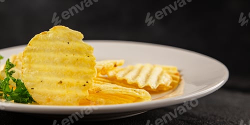 Preview: potato chips ribbed fast food tasty snack fresh gourmet food background on the table