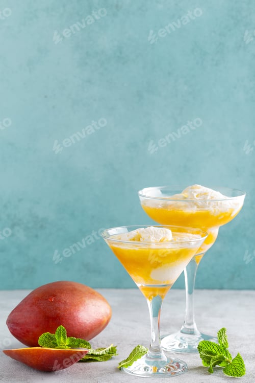 Preview: Refreshing summer mango cocktail with fresh juice and ice cream