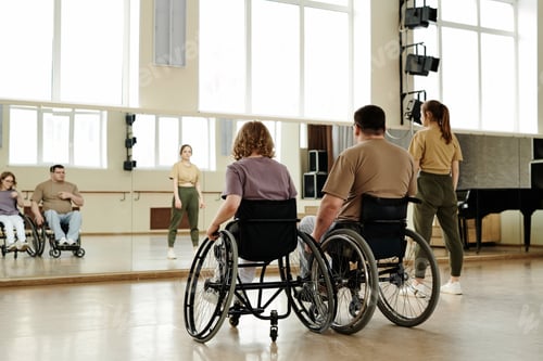 Preview: People Practicing Wheelchair Dance At Class In Studio