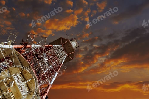 Preview: TV tower and plane Telecommunications tower against blue sky, in red and white