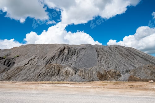 Preview: Stone rock pile mill from the mountain explosion with blue sky