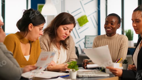 Preview: Diverse team of professionals coworkers, brainstorming in business meeting