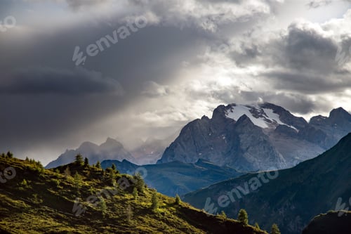 Preview: Marmolada Peak - 3343meters, the highest mountain in the Dolomites, Italy, with dramatic sky and fog