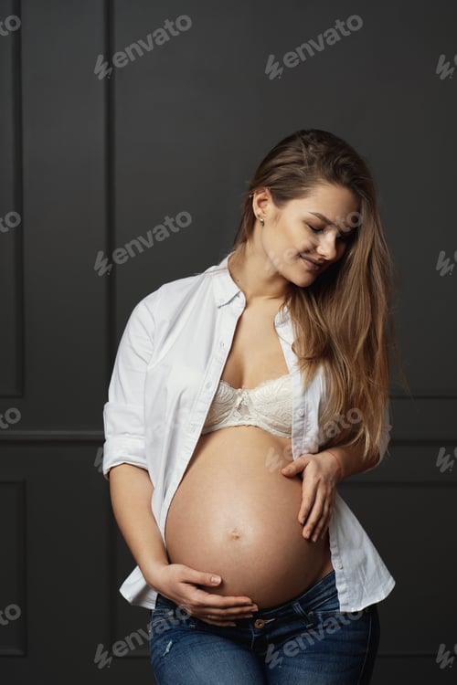 Preview: Smiling Pregnant Woman in Open Shirt