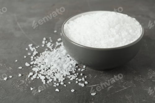 Preview: Bowl with natural sea salt on grey table