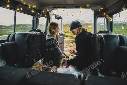Preview: Couple making a wanderlust vacation, exploring iceland with their 4x4 jeep