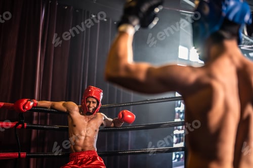 Preview: Two young professional boxer having a competition tournament on stage.