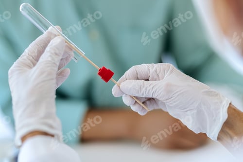 Preview: Close-up of doctor doing PCR test during COVID-19 pandemic.