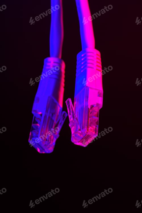 Preview: Modern technology network cable in neon light.
