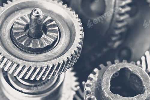 Preview: Close-up view of interlocking gears showcasing mechanical intricacy and craftsmanship