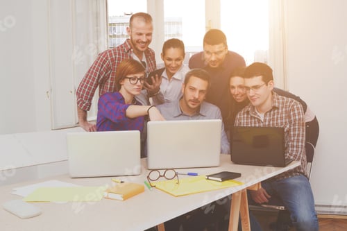 Preview: Young Group Of People Discussing Business Plans.