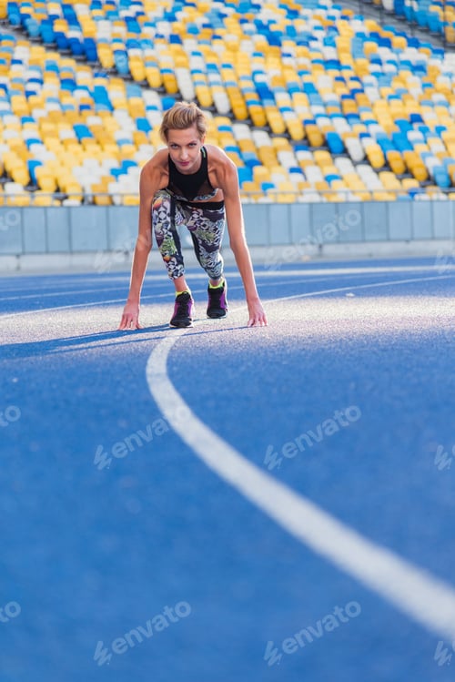 Preview: Fitness Trainer. Girl Doing Exercises At The Stadium