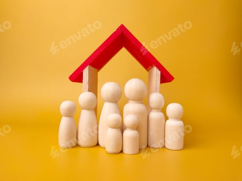 Preview: Wooden figures and wooden house with copy space. Concept of family and house.