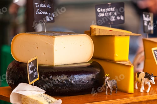 Preview: Chunks of different cheeses at a french market