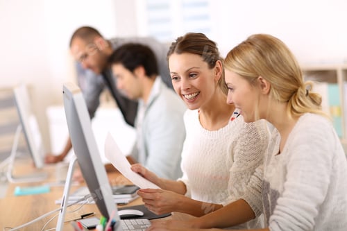 Preview: College Girls Working In Front Of Desktop