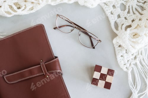 Preview: Selective focus table. Businessman hand write notebook, mobile phone, laptop