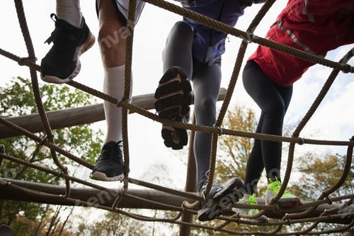 Preview: Team overcoming obstacle course challenge