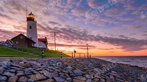 Preview: Lighthhouse of Urk Netherlands during sunset in the Netherlands