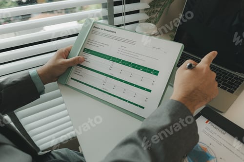 Preview: a businessman is in his private office and working with a lot of paperwork, a senior executive of ma
