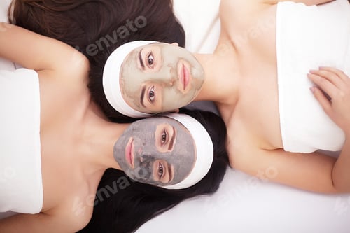 Preview: Use of a face mask to the face two young women in a beauty salon