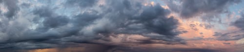 Preview: Cloudscape during a dark, rainy and colorful morning sunrise