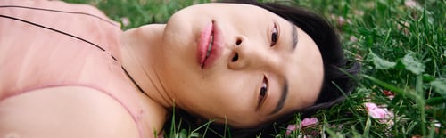Preview: Young man enjoys a relaxed moment in a park