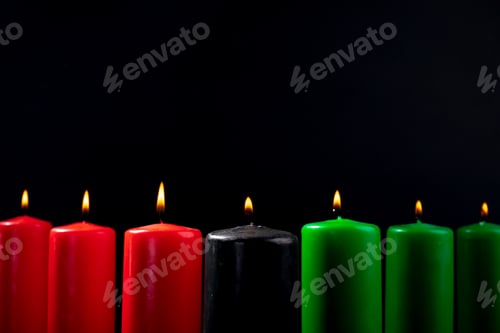 Preview: Composition of halloween candles and copy space on black background