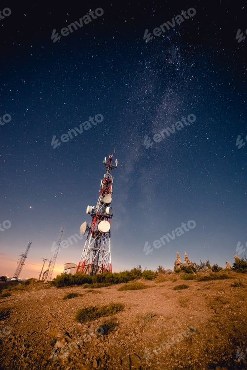 Preview: Communication tower and sky with stars in evening