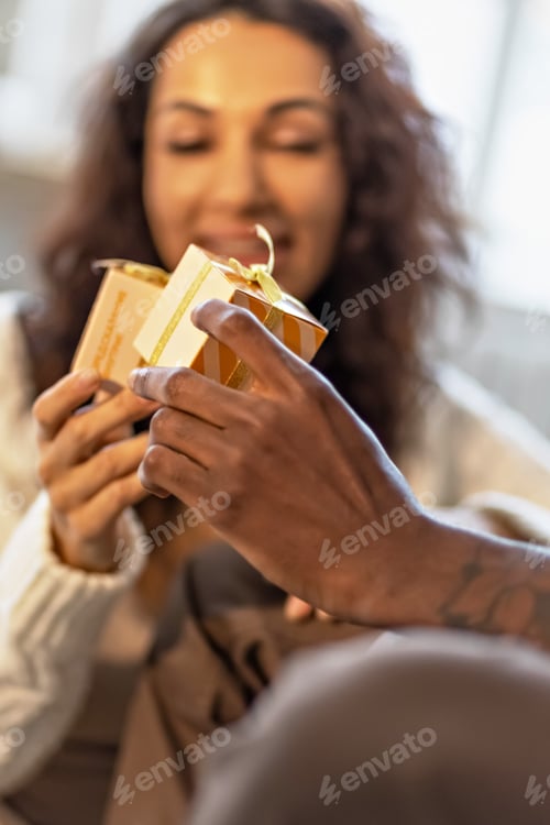 Preview: Woman Receiving Gift at Home Celebration Event