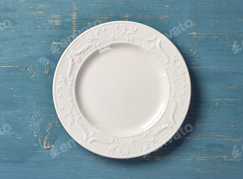 Preview: white plate on blue wooden table