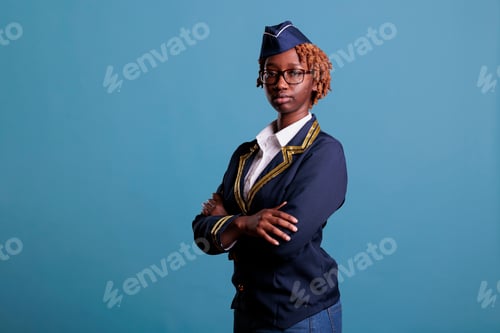 Preview: Close-up view of a flight attendant with arms crossed