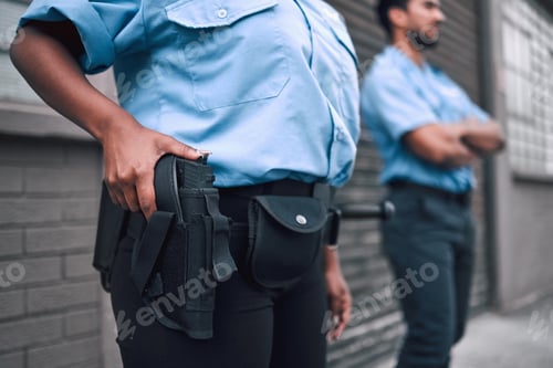Preview: Hand, gun and security with a police officer on duty or patrol in the city for safety and law enfor