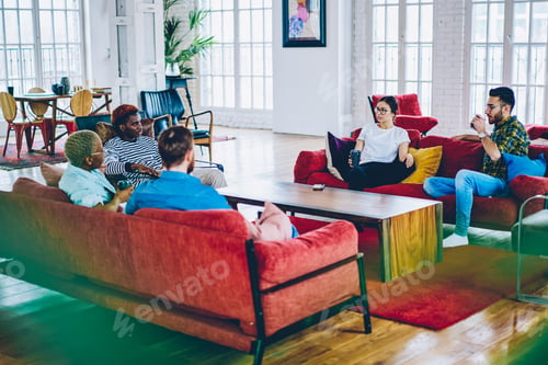 Preview: Best friends with coffee to go talking spending free time in apartment